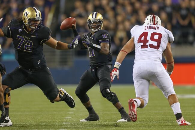 Hi-res-153102655-quarterback-keith-price-of-the-washington-huskies_crop_north