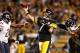 PITTSBURGH, PA - SEPTEMBER 22: Ben Roethlisberger #7 of the Pittsburgh Steelers throws a third quarter touchdown pass between Julius Peppers #90 and Major Wright #21 of the Chicago Bears at Heinz Field on September 22, 2013 in Pittsburgh, Pennsylvania. (Photo by Gregory Shamus/Getty Images)