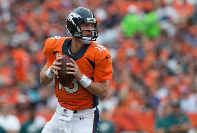 Hi-res-182607818-quarterback-peyton-manning-of-the-denver-broncos-rolls_crop_north
