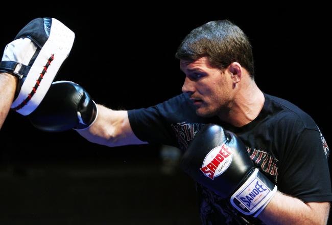 Hi-res-109336546-michael-bisping-does-some-glove-work-during-an-open_crop_north