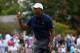 DUBLIN, OH - OCTOBER 03: Tiger Woods of USA celebrates making a putt on the 5th hole during Day One Four-Ball Matches at the Muirfield Village Golf Club on October 3, 2013 in Dublin, Ohio. (Photo by Andy Lyons/Getty Images)