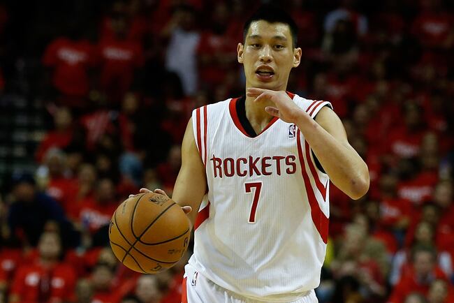 Hi-res-167995348-jeremy-lin-of-the-houston-rockets-brings-the-ball_crop_north