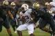 SEATTLE, WA - SEPTEMBER 27: Running back Stepfan Taylor #33 of the Stanford Cardinal rushes against defensive end Andrew Hudson #93 of the Washington Huskies on September 27, 2012 at CenturyLink Field in Seattle, Washington. (Photo by Otto Greule Jr/Getty Images)