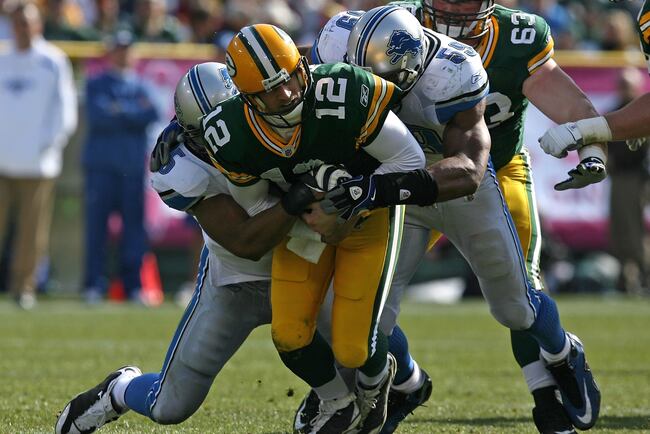 Hi-res-92305491-aaron-rodgers-of-the-green-bay-packers-is-sacked-by-turk_crop_north