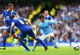 Hi-res-183151578-david-silva-of-manchester-city-is-challenged-by-phil_crop_north