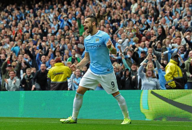 Hi-res-183151305-alvaro-negredo-of-manchester-city-celebrates-after_crop_north
