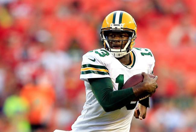 Hi-res-180334414-quarterback-vince-young-of-the-green-bay-packers-passes_crop_north