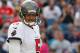 FOXBORO, MA - SEPTEMBER 22: Josh Freeman #5 of the Tampa Bay Buccaneers reacts after an incomplete pass in the second half against the Tampa Bay Buccaneers at Gillette Stadium on September 22, 2013 in Foxboro, Massachusetts. (Photo by Jim Rogash/Getty Images)