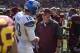 Sep 21, 2013; Minneapolis, MN, USA; San Jose State Spartans quarterback David Fales (10) and Minnesota Golden Gophers head coach Jerry Kill talk after the game at TCF Bank Stadium. The Gophers won 43-24. Mandatory Credit: Jesse Johnson-USA TODAY Sports