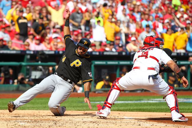 Hi-res-183103428-pedro-alvarez-of-the-pittsburgh-pirates-slides-safely_crop_north