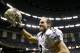 Sep 22, 2013; New Orleans, LA, USA; New Orleans Saints quarterback Drew Brees (9) celebrates as he runs off the field following a win over the Arizona Cardinals at Mercedes-Benz Superdome. The Saints defeated the Cardinals 31-7. Mandatory Credit: Derick E. Hingle-USA TODAY Sports