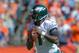 DENVER, CO - SEPTEMBER 29: Quarterback Michael Vick #7 of the Philadelphia Eagles scans downfield for a receiver during a game against the Denver Broncos at Sports Authority Field Field at Mile High on September 29, 2013 in Denver, Colorado. (Photo by Dustin Bradford/Getty Images)