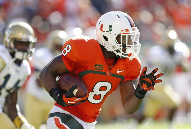 Hi-res-183173285-duke-johnson-of-the-miami-hurricanes-runs-with-the-ball_crop_north