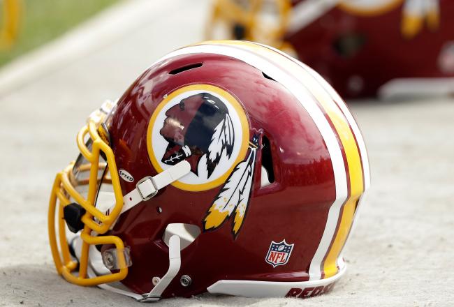 Hi-res-182622212-washington-redskins-helmets-lay-on-the-ground-during_crop_north