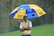 An umbrella might be the most important piece of equipment players have in their bag today.
