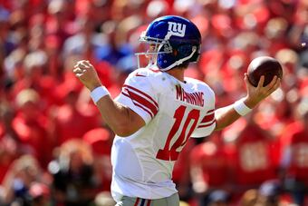 Hi-res-182351233-quarterback-eli-manning-of-the-new-york-giants-passes_crop_north