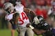EVANSTON, IL - OCTOBER 05: Carlos Hyde #34 of the Ohio State Buckeyes breaks away from Traveon Henry #10 of the Northwestern Wilcats to score a second half touchdown at Ryan Field on October 5, 2013 in Evanston, Illinois. Ohio State defeated Northwestern 40-30. (Photo by Jonathan Daniel/Getty Images)