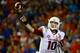 Arkansas QB Brandon Allen attempts a pass against Florida.
