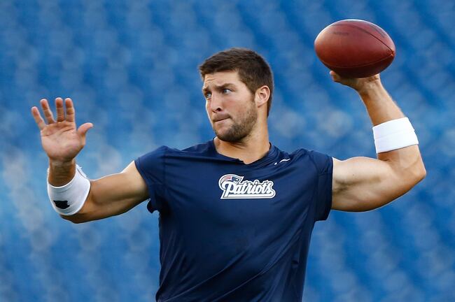 Hi-res-176655838-tim-tebow-of-the-new-england-patriots-warms-up-prior-to_crop_north