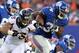 Sep 15, 2013; East Rutherford, NJ, USA; New York Giants running back Brandon Jacobs (34) runs against the Denver Broncos during the second quarter of a game at MetLife Stadium. Mandatory Credit: Brad Penner-USA TODAY Sports