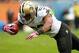 CHICAGO, IL - OCTOBER 06: Pierre Thomas #23 of the New Orleans Saints dives into the end zone to score a touchdown against the Chicago Bears at Soldier Field on October 6, 2013 in Chicago, Illinois. (Photo by Jonathan Daniel/Getty Images)