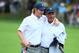 DUBLIN, OH - OCTOBER 06: U.S. Team Captain Fred Couples (R) walks with Brandt Snedeker up the 18th hole during the Day Four Singles Matches at the Muirfield Village Golf Club on October 6, 2013 in Dublin, Ohio. (Photo by Andy Lyons/Getty Images)