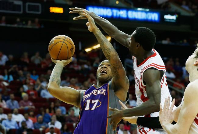 Hi-res-166183150-tucker-of-the-phoenix-suns-drives-past-patrick-beverly_crop_north