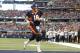 Oct 6, 2013; Arlington, TX, USA; Denver Broncos quarterback Peyton Manning (18) runs for a one yard touchdown in the second quarter against the Dallas Cowboys at AT&T Stadium. Mandatory Credit: Tim Heitman-USA TODAY Sports