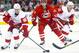 October 4, 2013; Raleigh, NC, USA; Detroit Red Wings forward Stephen Weiss (90) carries the puck against Carolina Hurricanes forward Eric Staal at PNC Center. The Red Wings won 3-2 in overtime. Mandatory Credit: James Guillory-USA TODAY Sports