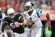 GLENDALE, AZ - OCTOBER 06: Quarterback Cam Newton #1 of the Carolina Panthers scrambles with the football past linebacker Daryl Washington #58 of the Arizona Cardinals during the NFL game at the University of Phoenix Stadium on October 6, 2013 in Glendale, Arizona. The Cardinals defeated the Panthers 22-6. (Photo by Christian Petersen/Getty Images)