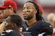 GLENDALE, AZ - OCTOBER 06: Wide receiver Larry Fitzgerald #11 of the Arizona Cardinals watches from the sidelines during the NFL game against the Carolina Panthers at the University of Phoenix Stadium on October 6, 2013 in Glendale, Arizona. The Cardinals defeated the Panthers 22-6. (Photo by Christian Petersen/Getty Images)