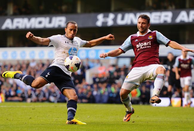 Hi-res-183444672-andros-townsend-of-tottenham-shoots-under-pressure-from_crop_north