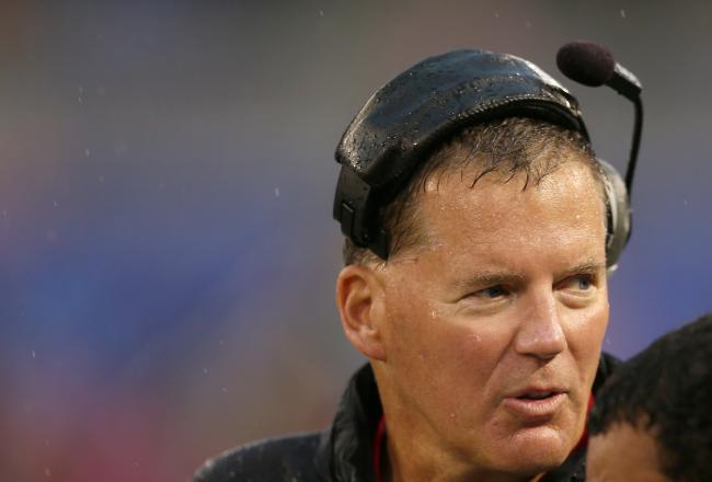 Hi-res-181477745-head-coach-randy-edsall-talks-with-linebacker-alex_crop_north