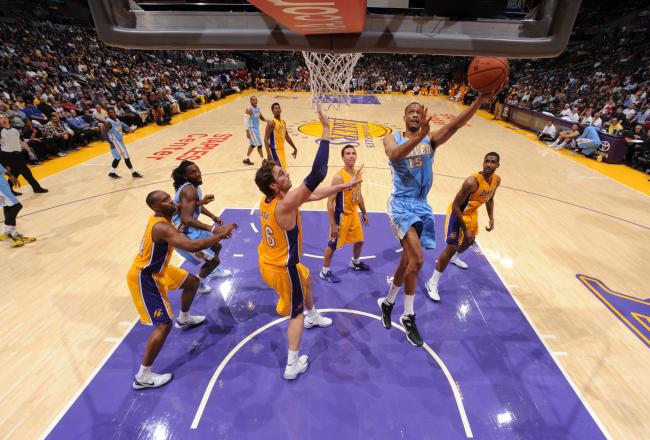 Hi-res-183484846-anthony-randolph-of-the-denver-nuggets-shoots-a-layup_crop_north