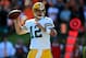 Sep 22, 2013; Cincinnati, OH, USA; Green Bay Packers quarterback Aaron Rodgers (12) looks to throw a pass during the fourth quarter against the Cincinnati Bengals at Paul Brown Stadium. Mandatory Credit: Andrew Weber-USA TODAY Sports