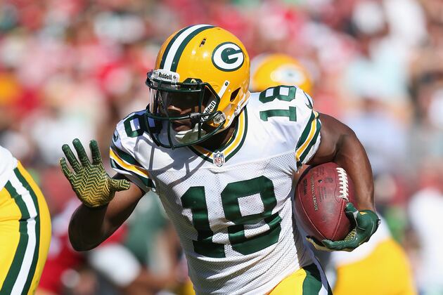 Cobb Provides Spark as Packers Thrash Lions