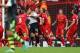 LIVERPOOL, ENGLAND - AUGUST 17: Simon Mignolet of Liverpool is congratulated by his captain Steven Gerrard after saving a penalty from Jonathan Walters of Stoke City during the Barclays Premier League match between Liverpool and Stoke City at Anfield on August 17, 2013 in Liverpool, England. (Photo by Clive Brunskill/Getty Images)