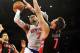 Feb 13, 2013; New York, NY, USA; New York Knicks small forward Carmelo Anthony (7) attempts a shot over Toronto Raptors center Andrea Bargnani (7) during the second half at Madison Square Garden. The Raptors won the game 92-88. Mandatory Credit: Joe Camporeale-USA TODAY Sports