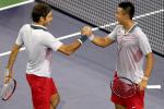 Federer Teams with Chinese No. 1 for Doubles Win 