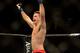 Jul. 7, 2012; Las Vegas, NV, USA; UFC fighter Demian Maia (left) celebrates his win over Dong Hyun Kim during a welterweigh bout in UFC 148 at the MGM Grand Garden Arena. Mandatory Credit: Mark J. Rebilas-USA TODAY Sports