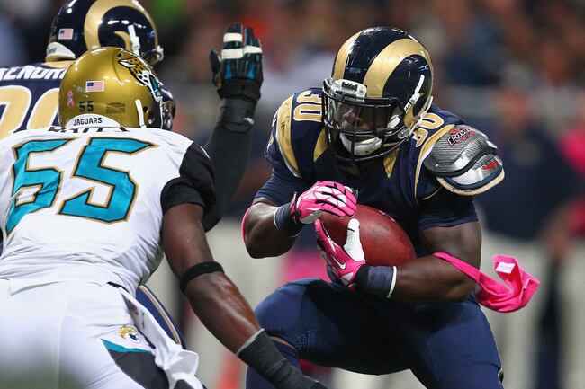 Hi-res-183457127-zac-stacy-of-the-st-louis-rams-rushes-against-the_crop_north