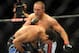 Jul 6, 2013; Las Vegas, NV, USA; Mike Pierce (white trunks) and David Mitchell (black trunks) during their welterweight bout at the MGM Grand Garden Arena. Mandatory Credit: Jayne Kamin-Oncea-USA TODAY Sports