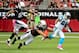 Oct 6, 2013; Phoenix, AZ, USA; Carolina Panthers wide receiver Steve Smith (89) is tackled by Arizona Cardinals linebacker Matt Shaughnessy (91) as linebacker John Abraham (55) defends during the first half at University of Phoenix Stadium. Mandatory Credit: Matt Kartozian-USA TODAY Sports