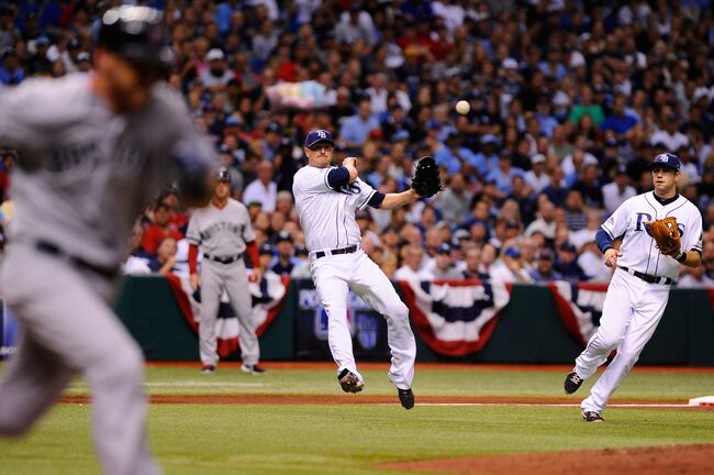 Hi-res-183592061-alex-cobb-of-the-tampa-bay-rays-throws-to-first-to-get_crop_north