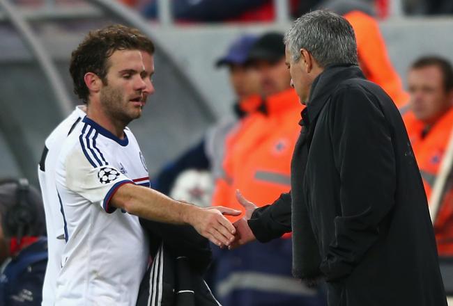 Hi-res-182609087-juan-mata-of-chelsea-shakes-hands-with-manager-jose_crop_north