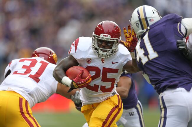 Hi-res-154077938-running-back-silas-redd-of-the-usc-trojans-rushes-for-a_crop_north