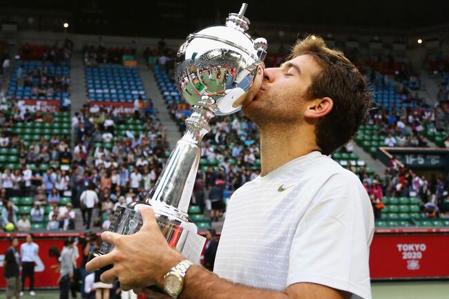 Hi-res-183227381-winner-juan-martin-del-potro-of-argentina-kisses-his_crop_north