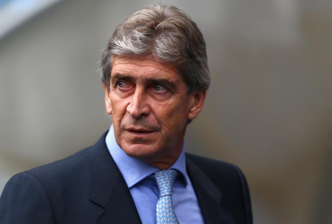 Hi-res-183153400-manuel-pellegrini-the-manager-of-manchester-city-looks_crop_north