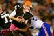 Oct 3, 2013; Cleveland, OH, USA; Cleveland Browns quarterback Brandon Weeden (3) is sacked by Buffalo Bills defensive end Mario Williams (94) during the third quarter at FirstEnergy Stadium. Mandatory Credit: Andrew Weber-USA TODAY Sports
