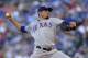 KANSAS CITY, MO - SEPTEMBER 21: Starting pitcher Matt Garza #22 of the Texas Rangers throws in the first inning against the Kansas City Royals at Kauffman Stadium on September 21, 2013 in Kansas City, Missouri. (Photo by Ed Zurga/Getty Images)